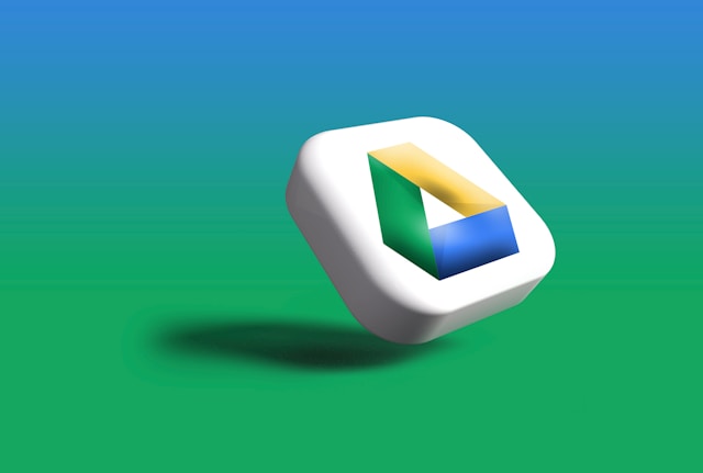 The Google Drive 3D icon logo against a green and blue background.