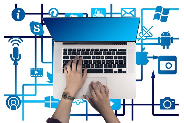 A person typing on a laptop surrounded by icons representing file sharing and digital communication.