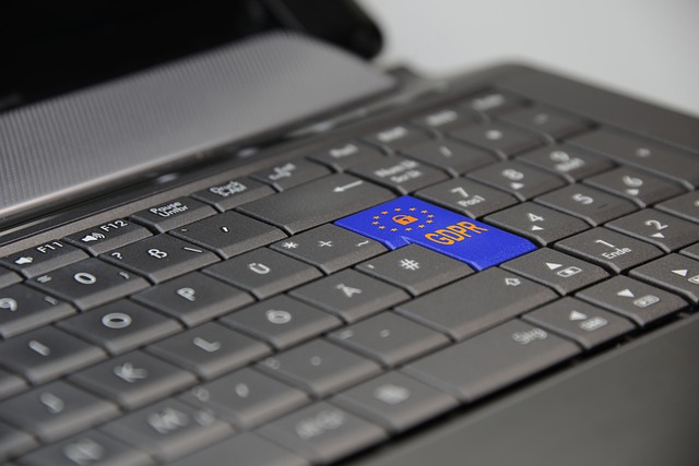 A close-up of a keyboard with a blue GDPR key featuring EU stars.