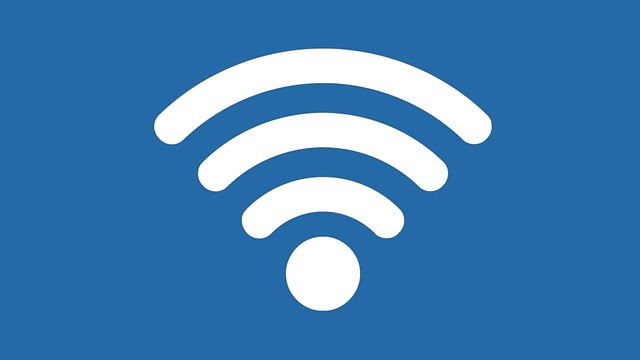 A public Wi-Fi symbol in white on a blue background, representing wireless connectivity and internet access.